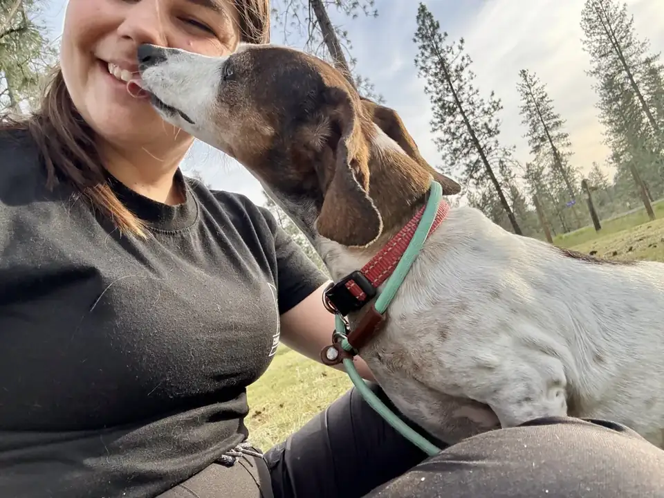 Shayla LaMonica with a board and train dog at her home outside Spokane